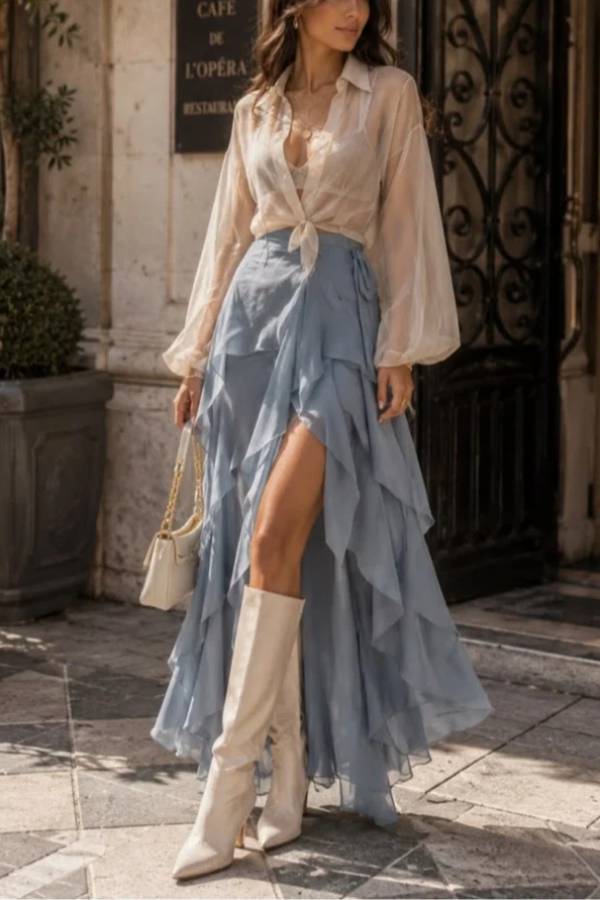 White sheer shirt paired with a blue layered skirt set