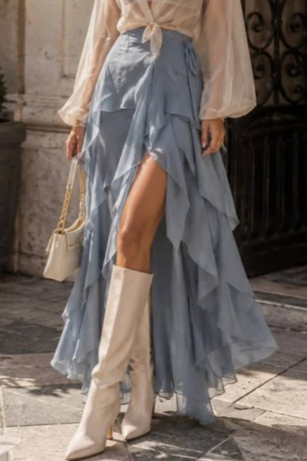 White sheer shirt paired with a blue layered skirt set
